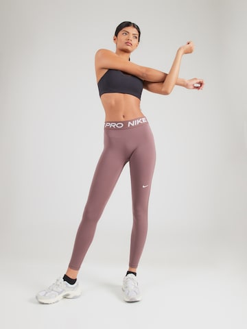 NIKE Skinny Sportnadrágok 'NP 365' - lila