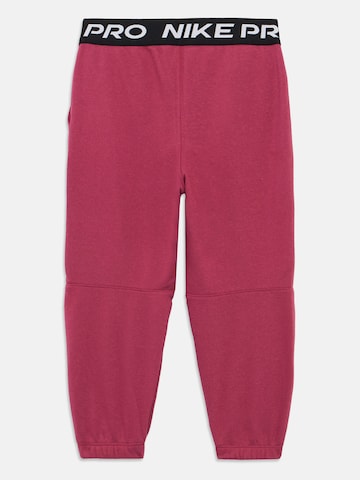 Nike Sportswear Дънки Tapered Leg Панталон 'PRO' в розово