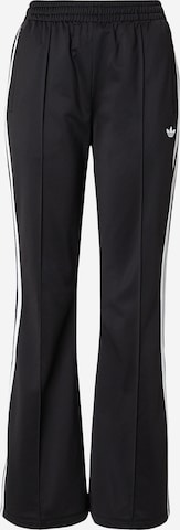 ADIDAS ORIGINALSFlared/zvonoliki kroj Hlače 'Firebird' - crna boja: prednji dio