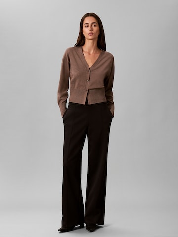 Calvin Klein Regular Pleat-Front Pants in Black: front