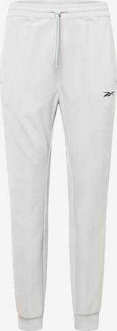 Effilé Pantalon de sport 'Workout Ready' Reebok en gris : devant