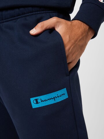 Champion Authentic Athletic Apparel Tapered Broek in Blauw