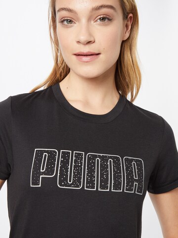 T-shirt fonctionnel 'Starddust' PUMA en noir