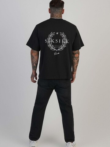 Tapered Jeans di SikSilk in nero