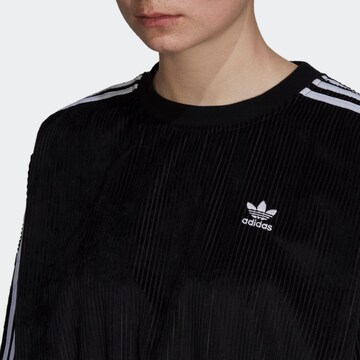 Bluză de molton de la ADIDAS ORIGINALS pe negru