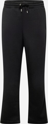 TOPMAN Regular Pants in Black: front