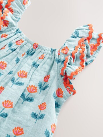 Ensemble Next en bleu