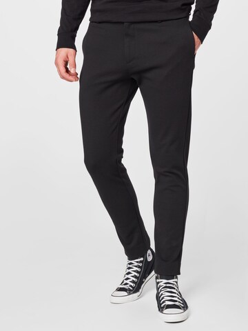 Clean Cut Copenhagen - Slimfit Calças chino 'Milano' em preto: frente