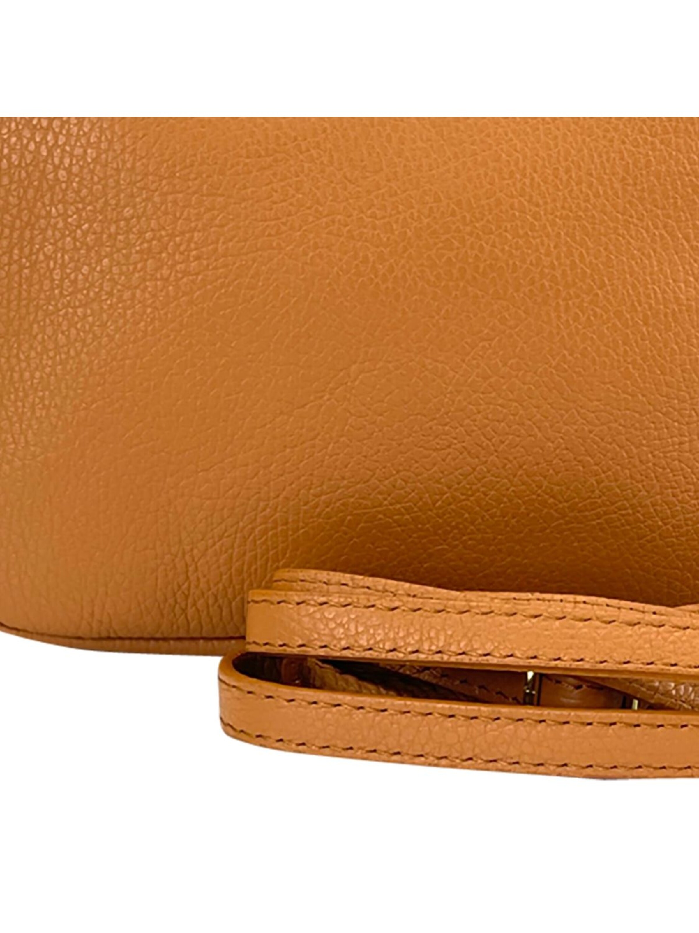 Florence Schoudertas in Bruin