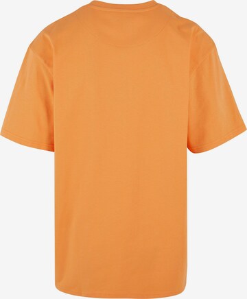 Karl Kani Paita 'Essential' värissä oranssi