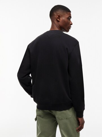 Tommy Jeans Collegepaita värissä musta