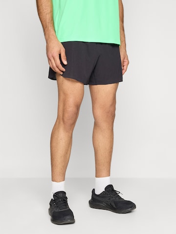 juoda ASICS Standartinis Sportinės kelnės 'METARUN 5IN': priekis