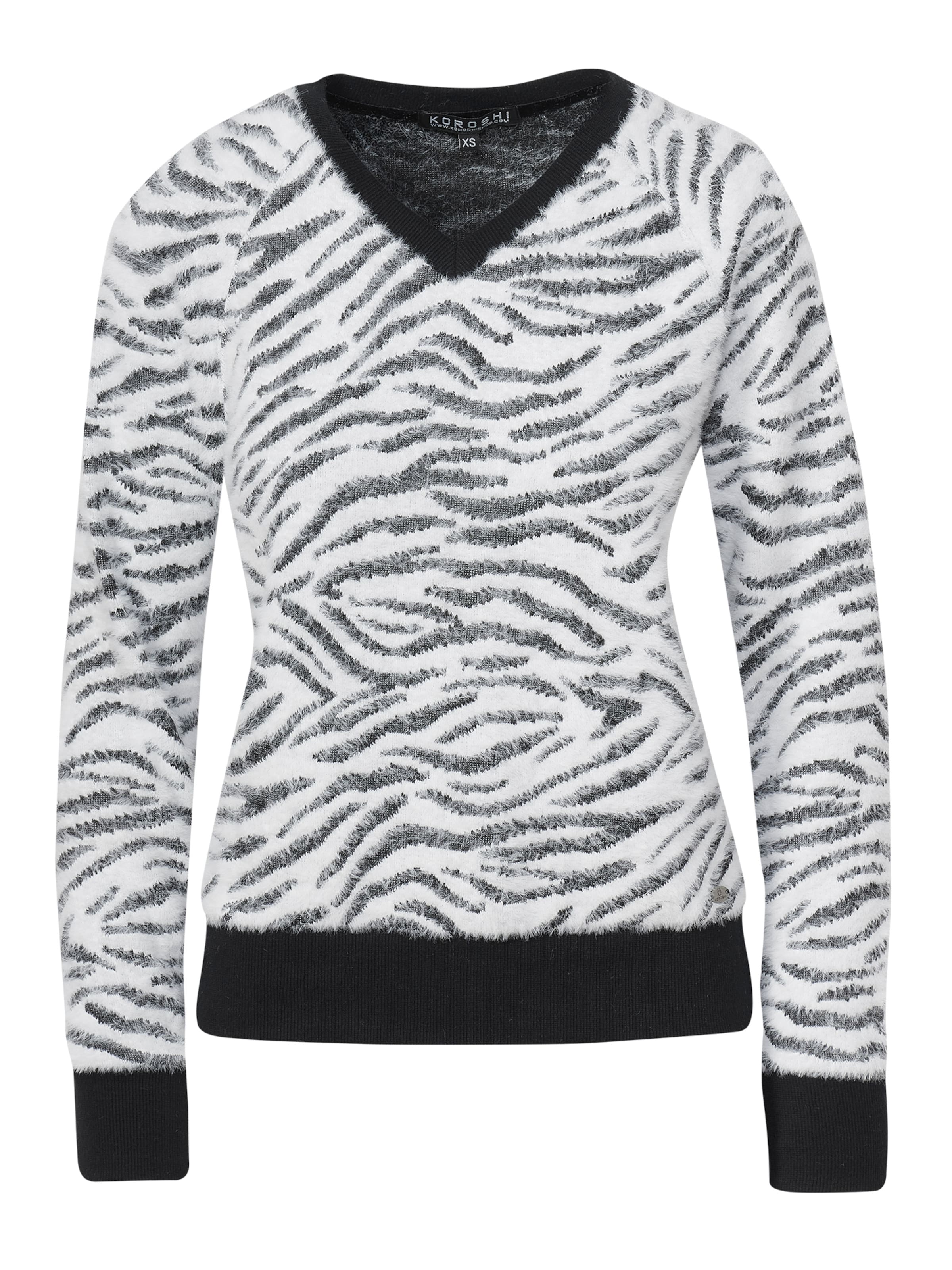 Pulover de la KOROSHI pe alb: față