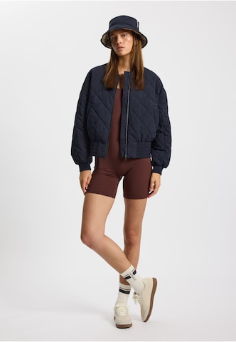 Veste mi-saison 'Lyon' rethinkit studios en bleu