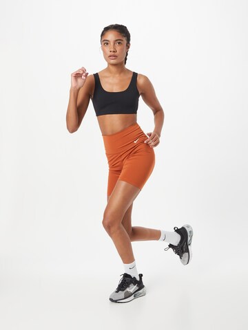 NIKE Skinny Sportovní kalhoty 'ONE' – oranžová