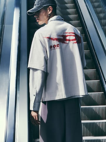 T-Shirt 'OUT OF CORE' Bershka en gris