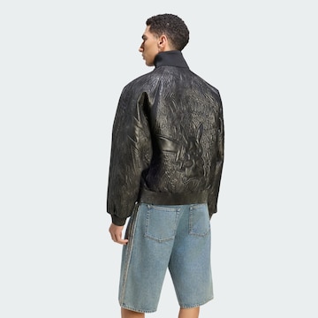 ADIDAS ORIGINALS Jacke 'Pokémon' in Schwarz