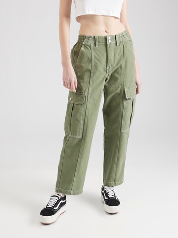 Loosefit Pantalon cargo 'SIDEWALK MUSIC ACADEMY' VANS en vert : devant