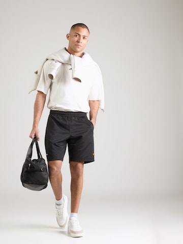 Regular Pantaloni 'Bertoni' de la ELLESSE pe negru
