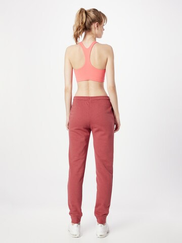 Nike Sportswear Zúžený Kalhoty 'EMEA' – červená