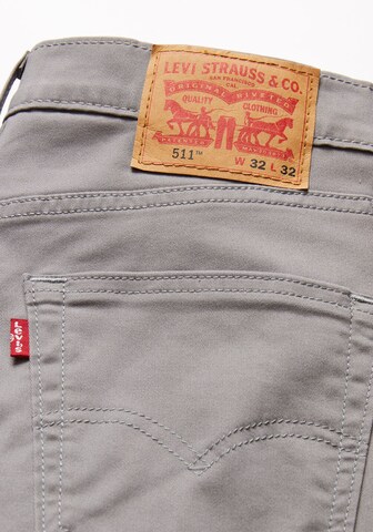 LEVI'S ® Slimfit Jeans '511' in Grau