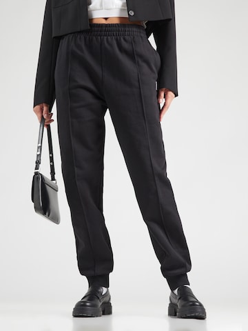 DKNY Tapered Hose in Schwarz: Vorderseite