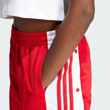 ADIDAS ORIGINALS Loose fit Trousers 'Adibreak' in Red