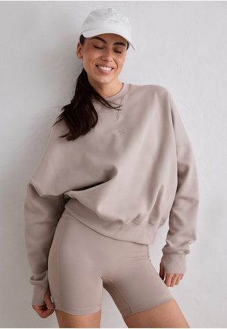 Sweat de sport 'Le Run' Aim'n en marron : devant
