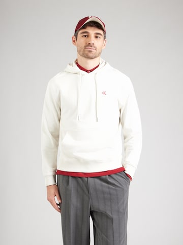 Sweat-shirt Calvin Klein Jeans en blanc : devant