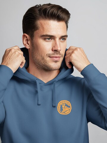 Neverless Sweatshirt 'Landschaft Badge' in Blau