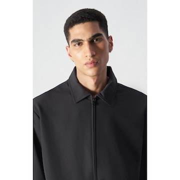 Champion Authentic Athletic Apparel Sportjacke 'Legacy' in Schwarz