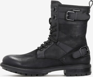 Kazar Lace-Up Boots in Black: front