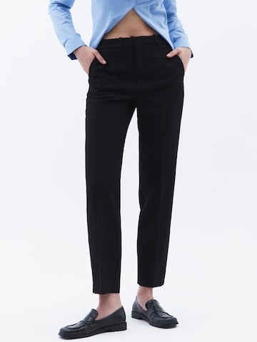 OXXO Tapered Trousers with creases in Black: front