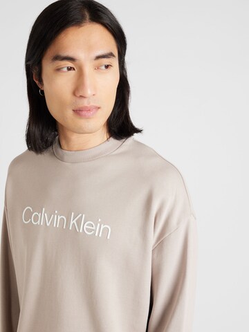 Calvin Klein Bluzka sportowa w kolorze beżowy