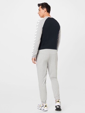 Effilé Pantalon de sport Hummel en gris