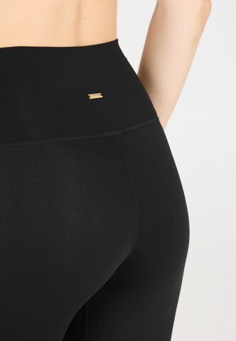 Athlecia Skinny Tights 'Snyder' in Schwarz