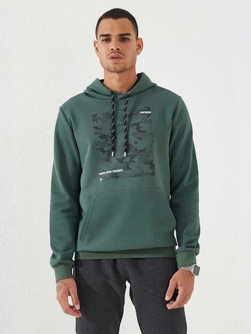 Sweat-shirt Tommy Life en vert : devant