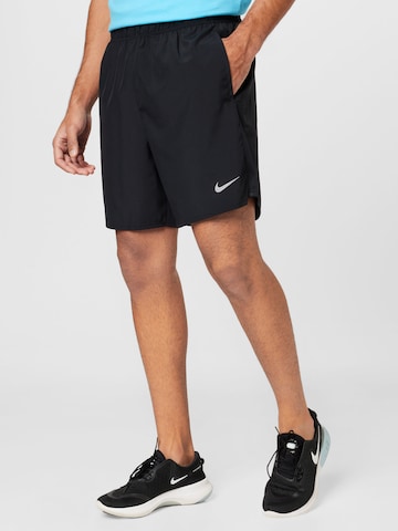 NIKE Regular Workout Pants in Black: front