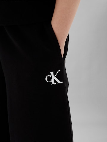 Calvin Klein Jeans Wide leg Trousers in Black