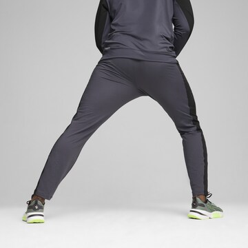 PUMA Regular Workout Pants in Grey