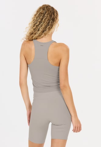 Athlecia Sports top 'Rihal' in Grey