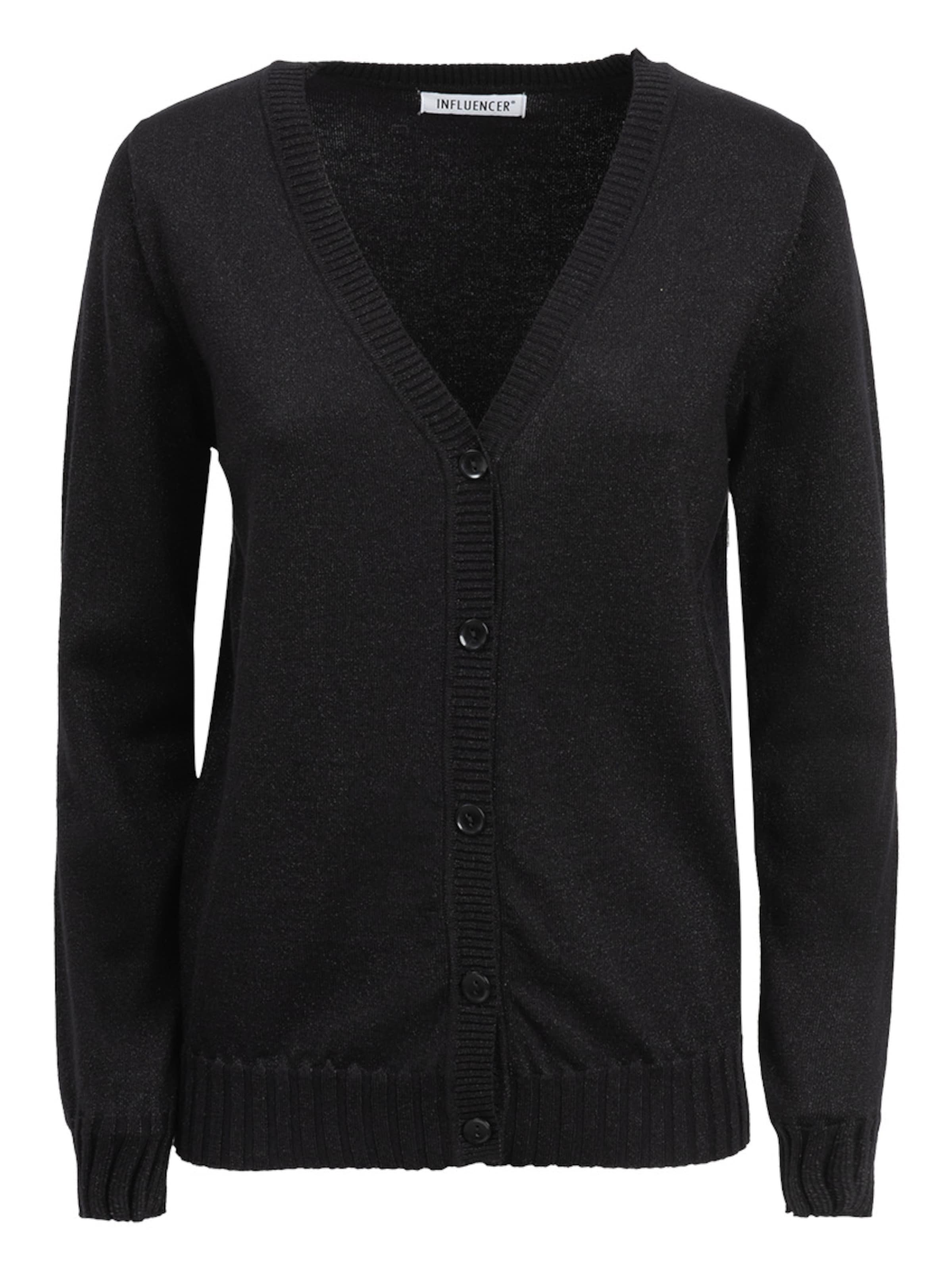 Influencer Πλεκτή ζακέτα σε μαύρο: μπροστά