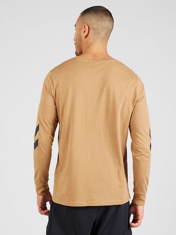 Hummel Functioneel shirt 'Legacy' in Bruin