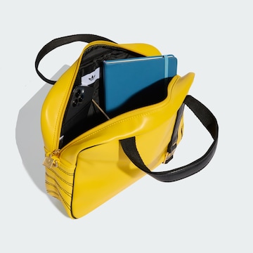 ADIDAS ORIGINALS Handtasche 'Airliner' in Gelb