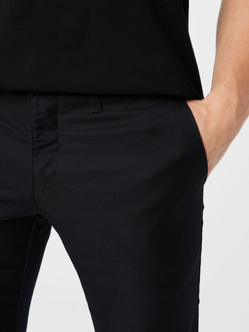 Carhartt WIP Slimfit Chinohose 'Sid' in Schwarz