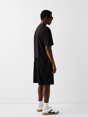 Bershka Loosefit Shorts in Schwarz