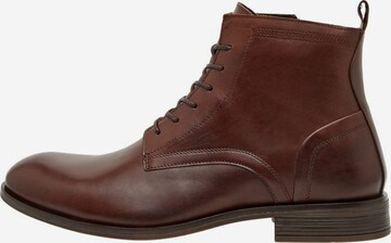 Bianco Lace-Up Boots in Brown: front