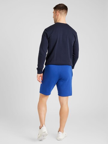 Champion Authentic Athletic Apparel Regular Trousers in Blue