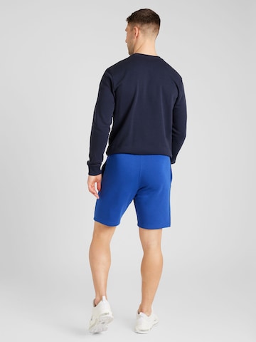 Regular Pantaloni de la Champion Authentic Athletic Apparel pe albastru