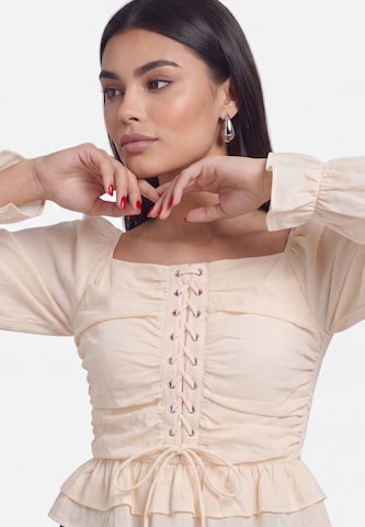faina - Blusa en beige